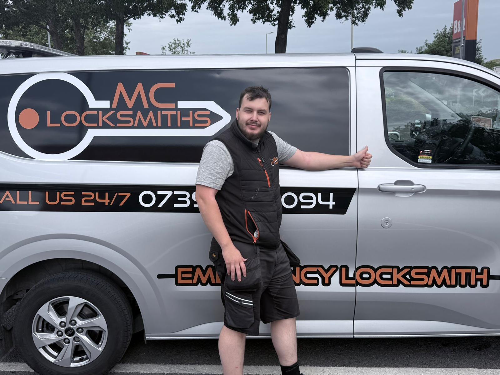 Morgan C. with the MC Locksmiths branded service van